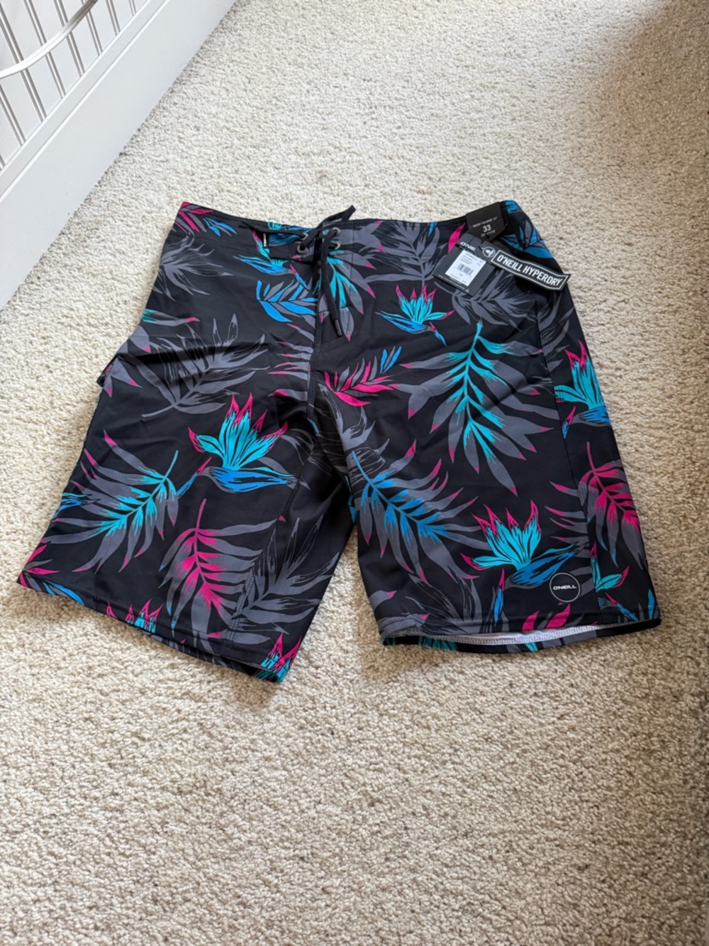 O'Neill Black Swim Shorts with Blue & Pink Tropical Leaf Print